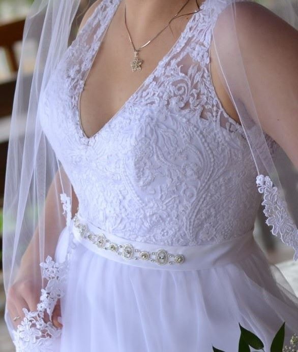 wedding dress altered for shoulder and arm hole fit and custom rhinestone belt added to dress