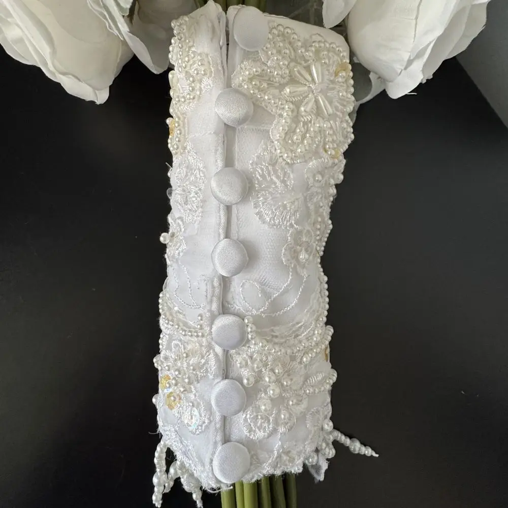 bouquet wrap with covered dress buttons refashioned from mother's wedding dress