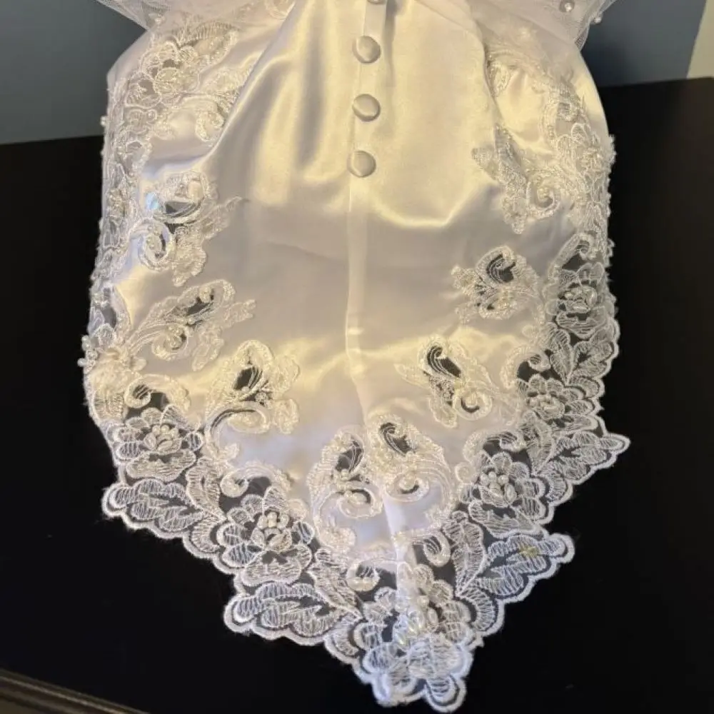 back view of train on angel holiday ornament refashioned from a vintage wedding dress