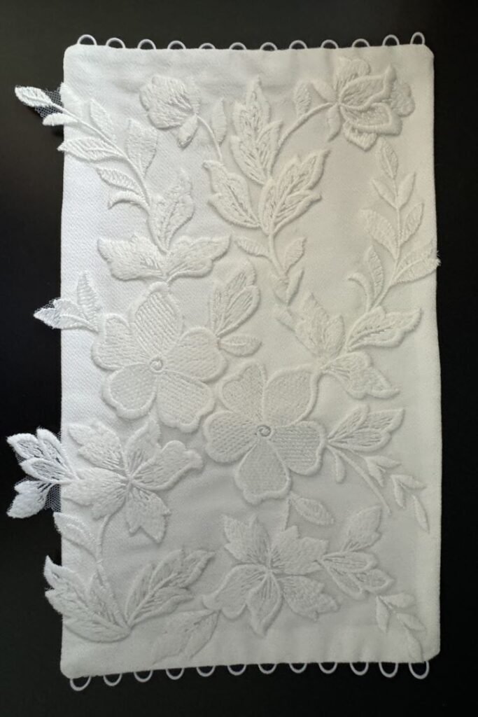 custom redesigned lace motif on bouquet wrap using extra lace from wedding dress